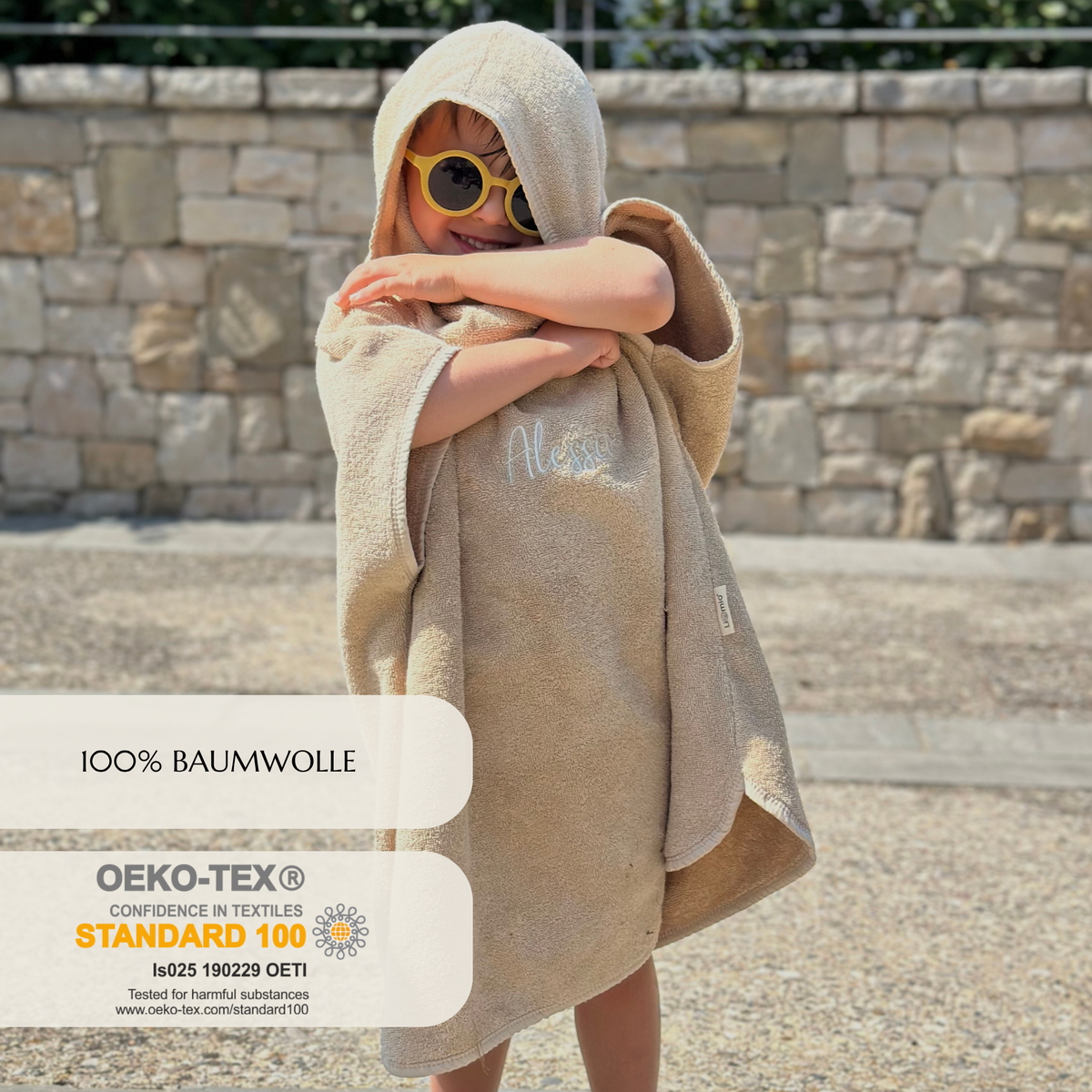 Kinderponcho mit Kapuze in beige